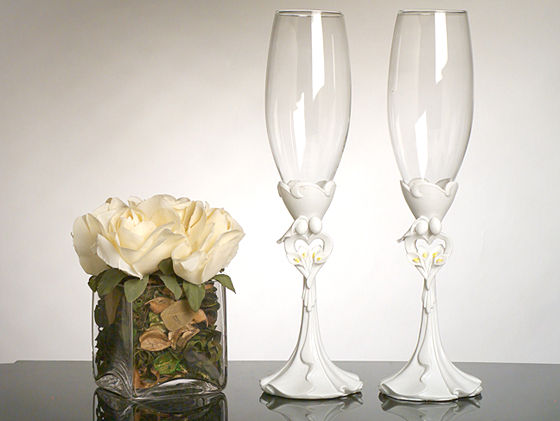 Bride And Groom With Calla Lily Bouquet Toasting Glasses