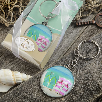 Beach themed flip flop design key chain with a clear glass dome
