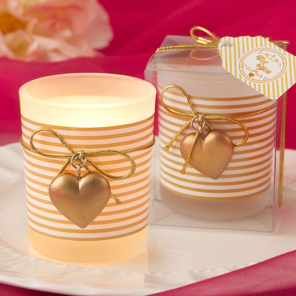 Glass gold heart design votive candle holder with a white and gold striped design